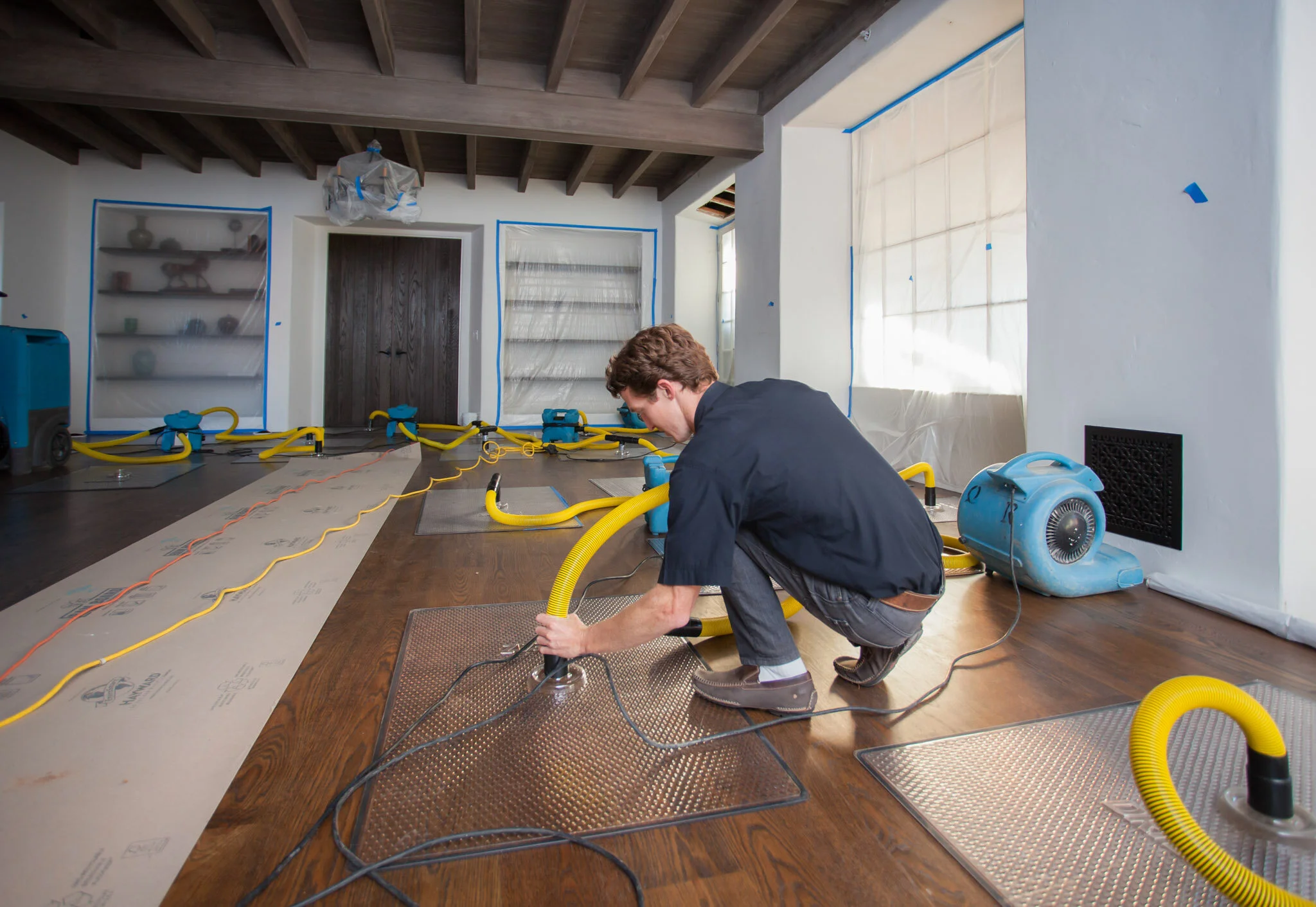 Emergency water damage restoration team at work